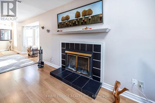 A5 - 1651 Nash Road, Clarington, ON - Indoor Photo Showing Living Room With Fireplace