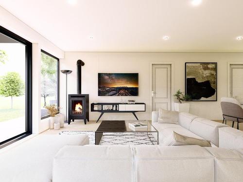 Living room - Place Goyette, Sainte-Julienne, QC - Indoor Photo Showing Living Room With Fireplace