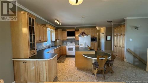 2 Roland J. Martin Street, Saint-Léonard, NB - Indoor Photo Showing Kitchen With Double Sink