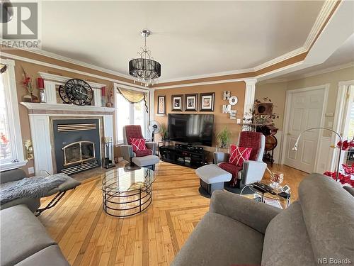7 Des Sapins Street, Kedgwick, NB - Indoor Photo Showing Living Room With Fireplace