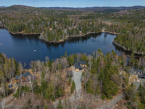 Aerial photo - 25 Rue Du Randonneur, Sainte-Marguerite-Du-Lac-Masson, QC - Outdoor With Body Of Water With View