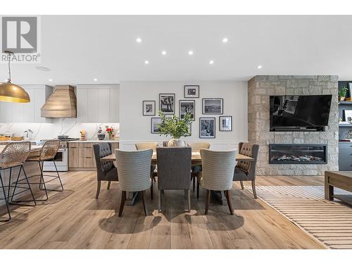 2838 Copper Ridge Drive, West Kelowna, BC - Indoor Photo Showing Dining Room With Fireplace