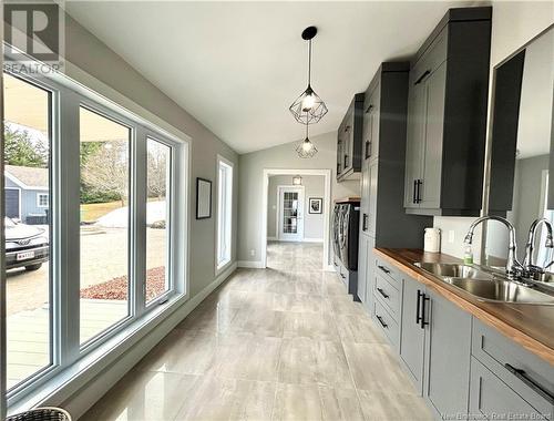 30 Allee 31, Charlo, NB - Indoor Photo Showing Kitchen With Double Sink