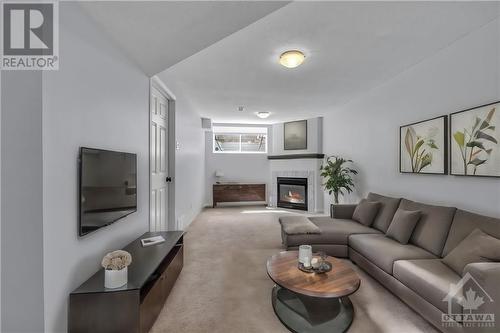 936 Schooner Crescent, Ottawa, ON - Indoor Photo Showing Living Room With Fireplace