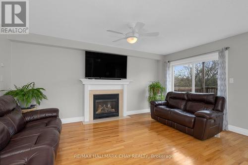 106 Bourbon Circle, Barrie, ON - Indoor Photo Showing Living Room With Fireplace