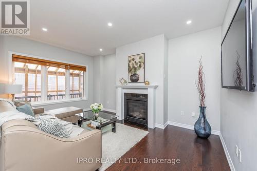 21 Magical Road, Brampton, ON - Indoor Photo Showing Living Room With Fireplace