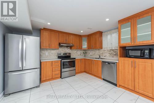 21 Magical Road, Brampton, ON - Indoor Photo Showing Kitchen With Double Sink