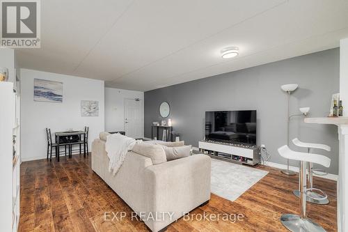 305 - 1390 Main Street E, Milton (Dempsey), ON - Indoor Photo Showing Living Room