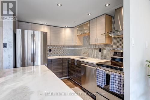 1013 - 3590 Kaneff Crescent, Mississauga, ON - Indoor Photo Showing Kitchen With Stainless Steel Kitchen With Upgraded Kitchen