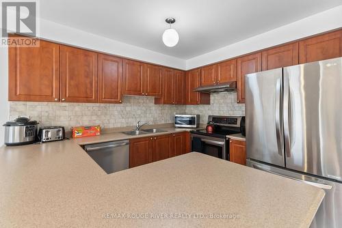 22 Maidstone Way, Whitby, ON - Indoor Photo Showing Kitchen With Double Sink