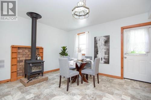 72 Applewood Drive, Trent Hills, ON - Indoor Photo Showing Dining Room With Fireplace