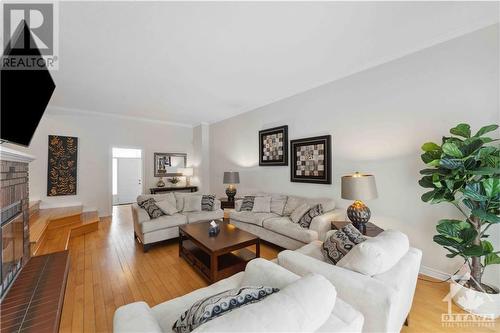 25 Rastila Crescent, Ottawa, ON - Indoor Photo Showing Living Room With Fireplace