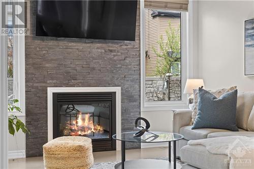 302 Summer Sky Street, Ottawa, ON - Indoor Photo Showing Living Room With Fireplace