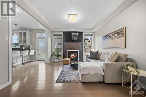 302 Summer Sky Street, Ottawa, ON - Indoor Photo Showing Living Room With Fireplace
