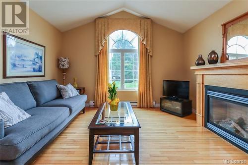 43 Concorde Crescent, Quispamsis, NB - Indoor Photo Showing Living Room With Fireplace