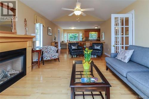 43 Concorde Crescent, Quispamsis, NB - Indoor Photo Showing Living Room With Fireplace