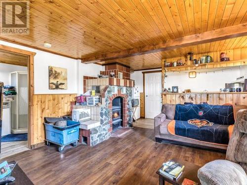 382 Judas Creek Drive, Whitehorse South, YT - Indoor Photo Showing Living Room With Fireplace