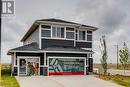 107 Chelsea Channel, Chestermere, AB  - Outdoor With Facade 