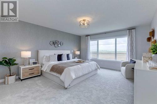 107 Chelsea Channel, Chestermere, AB - Indoor Photo Showing Bedroom
