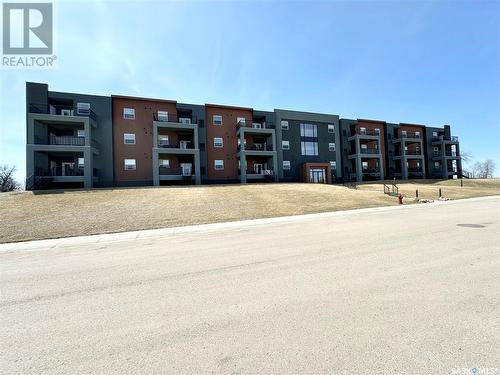 104 71 Riverwood Drive, Weyburn, SK - Outdoor With Balcony With Facade