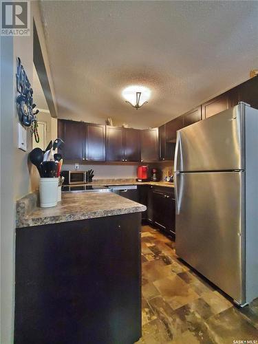 6 2707 7Th Street E, Saskatoon, SK - Indoor Photo Showing Kitchen With Stainless Steel Kitchen With Double Sink