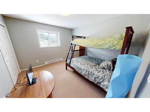 8912 Doherty Street, Canal Flats, BC - Indoor Photo Showing Bedroom