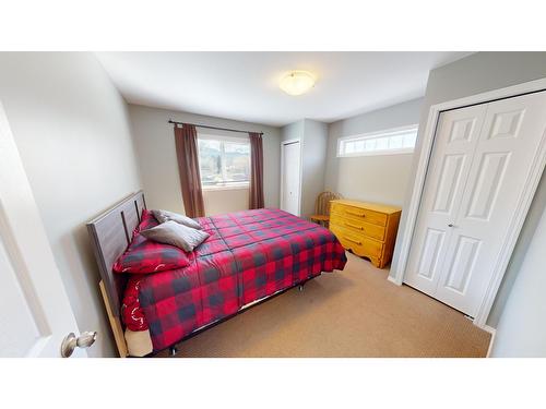 8912 Doherty Street, Canal Flats, BC - Indoor Photo Showing Bedroom
