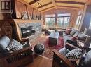 250 Feathertop Way Unit# 208, Big White, BC  - Indoor Photo Showing Living Room With Fireplace 