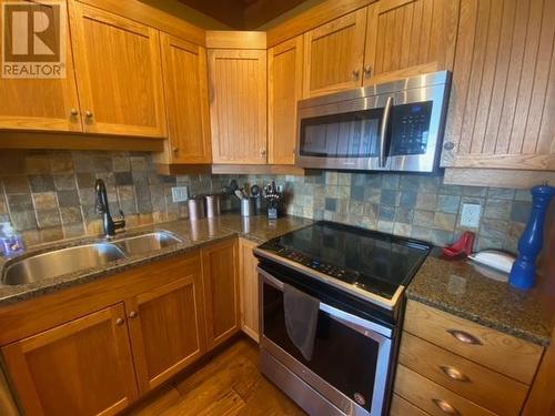 250 Feathertop Way Unit# 208, Big White, BC - Indoor Photo Showing Kitchen With Double Sink
