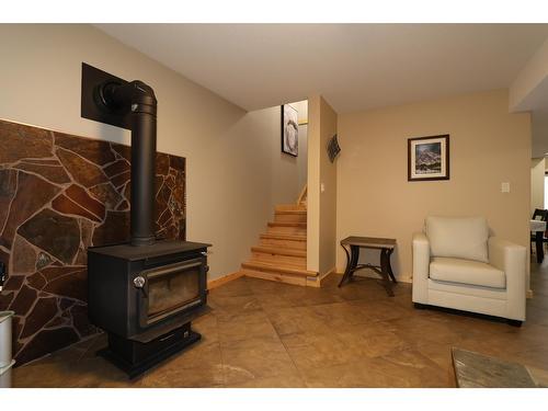 940 313Th Drive, Kimberley, BC - Indoor Photo Showing Other Room With Fireplace