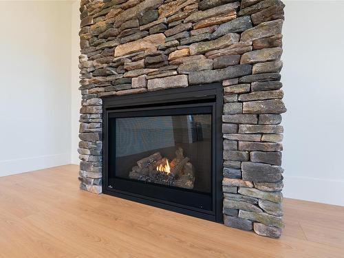 243 Dunbar Way, Parksville, BC - Indoor Photo Showing Living Room With Fireplace