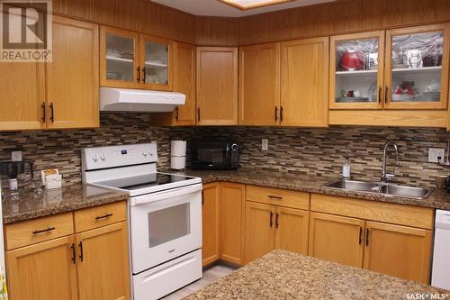 103 115 8Th Street, Weyburn, SK - Indoor Photo Showing Kitchen With Double Sink