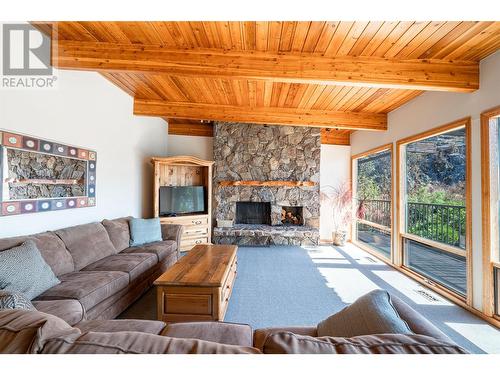 13710 Ponderosa Way, Coldstream, BC - Indoor Photo Showing Living Room With Fireplace