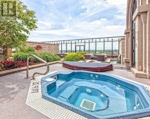 129 - 383 Prince Of Wales Drive, Mississauga, ON - Outdoor With In Ground Pool