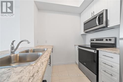 229 - 460 Dundas Street E, Hamilton, ON - Indoor Photo Showing Kitchen With Double Sink With Upgraded Kitchen