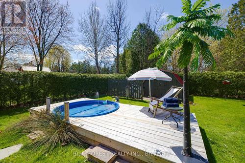174 Mc Arthur Street, Dutton/Dunwich, ON - Outdoor With Above Ground Pool With Backyard