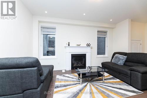 21 Mountainside Crescent, Whitby, ON - Indoor Photo Showing Living Room With Fireplace