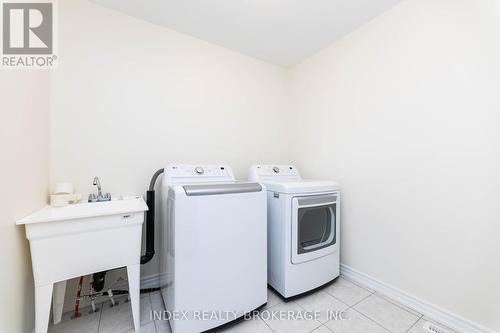 21 Mountainside Crescent, Whitby, ON - Indoor Photo Showing Laundry Room