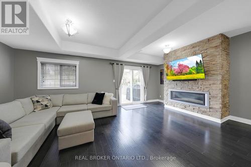 49 Wallace Street, New Tecumseth, ON - Indoor Photo Showing Living Room With Fireplace