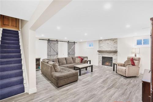 In-Law Rec Room - 1580 Mineral Springs Road, Ancaster, ON - Indoor With Fireplace