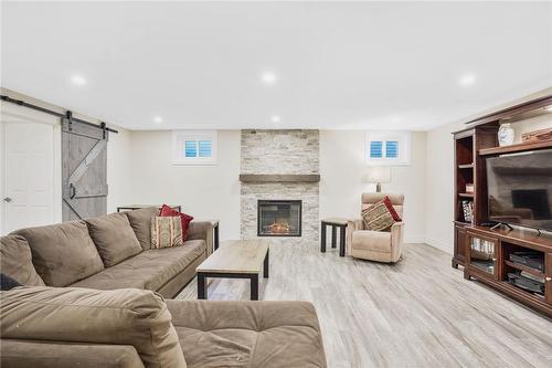 In-Law Rec Room - 1580 Mineral Springs Road, Ancaster, ON - Indoor With Fireplace