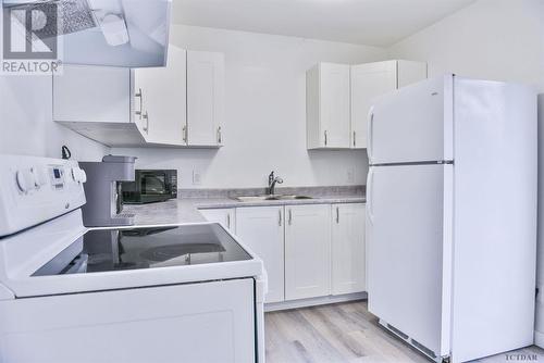 373 Randall Dr, Timmins, ON - Indoor Photo Showing Kitchen With Double Sink