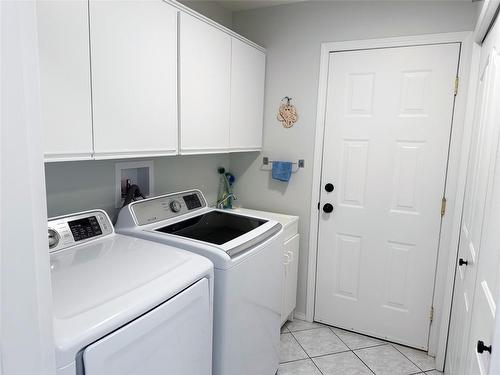 31-6526 Tucelnuit Drive, Oliver, BC - Indoor Photo Showing Laundry Room