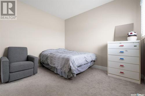 704 Scott Crescent, Warman, SK - Indoor Photo Showing Bedroom