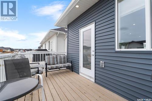 704 Scott Crescent, Warman, SK - Outdoor With Deck Patio Veranda With Exterior