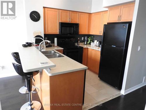 3110 - 3939 Duke Of York Boulevard, Mississauga, ON - Indoor Photo Showing Kitchen With Double Sink