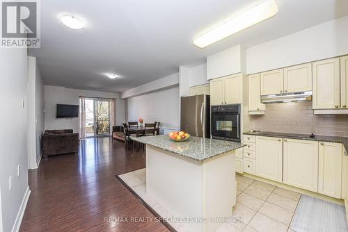 216 - 830 Scollard Court, Mississauga, ON - Indoor Photo Showing Kitchen With Upgraded Kitchen