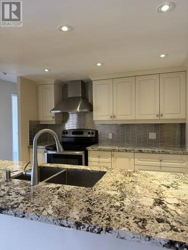308 - 25 Trailwood Drive, Mississauga, ON - Indoor Photo Showing Kitchen With Upgraded Kitchen