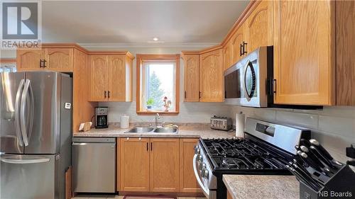 260 Acadie, Beresford, NB - Indoor Photo Showing Kitchen With Double Sink