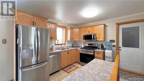 260 Acadie, Beresford, NB - Indoor Photo Showing Kitchen With Double Sink